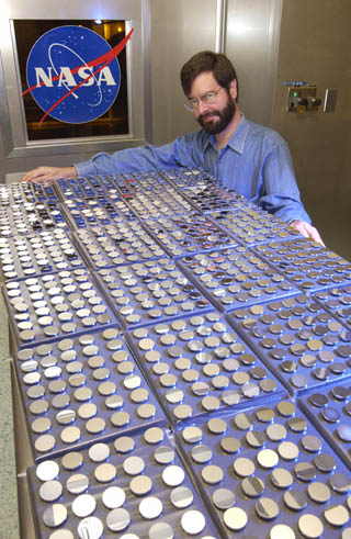 Image of several mirrors in flat clear plastic holder.