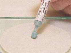 Applying a pea-sized blob of the compound