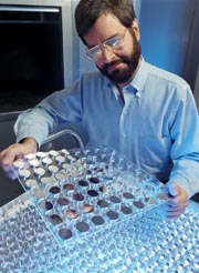 Image of several mirrors in flat clear plastic holder.